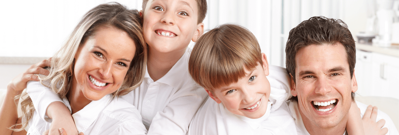 1200x406_Dental family Happy family portrait with all smiles