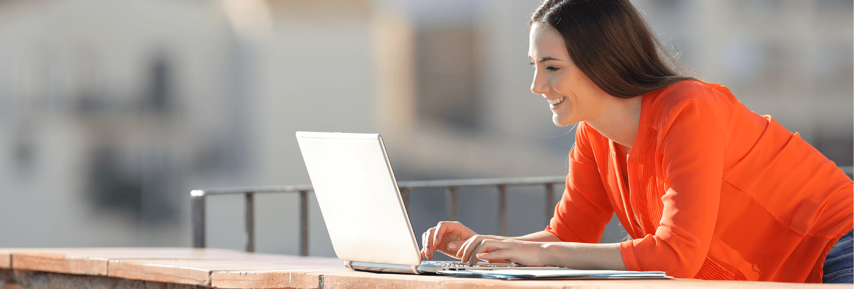 Female typing on a laptop computer