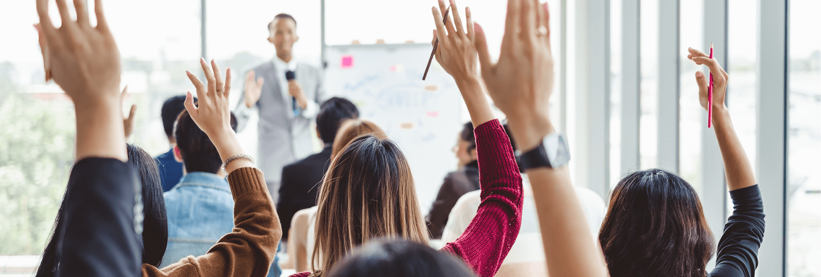 1200x406_FAQs People raising hands asking questions