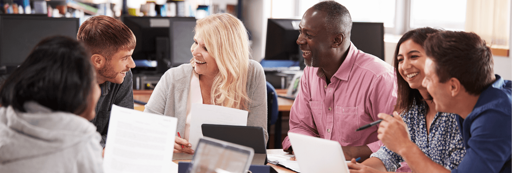 1200x406_Plan Docs Diverse group reviewing documents at a table